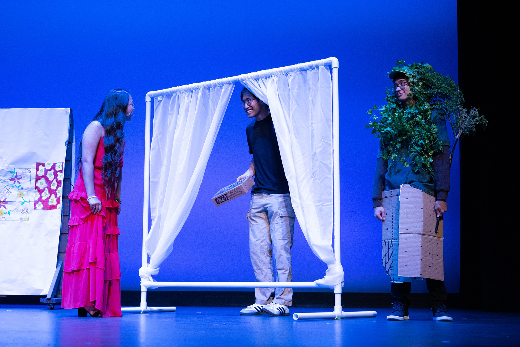 Window scene for love story with a boy playing a tree.